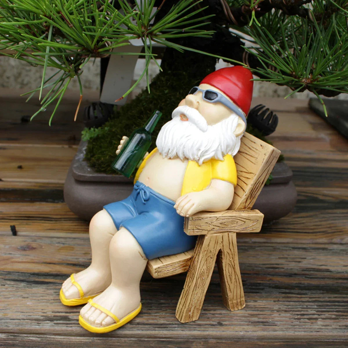 Garden Gnome Statue Sitting on Chair with Bottle